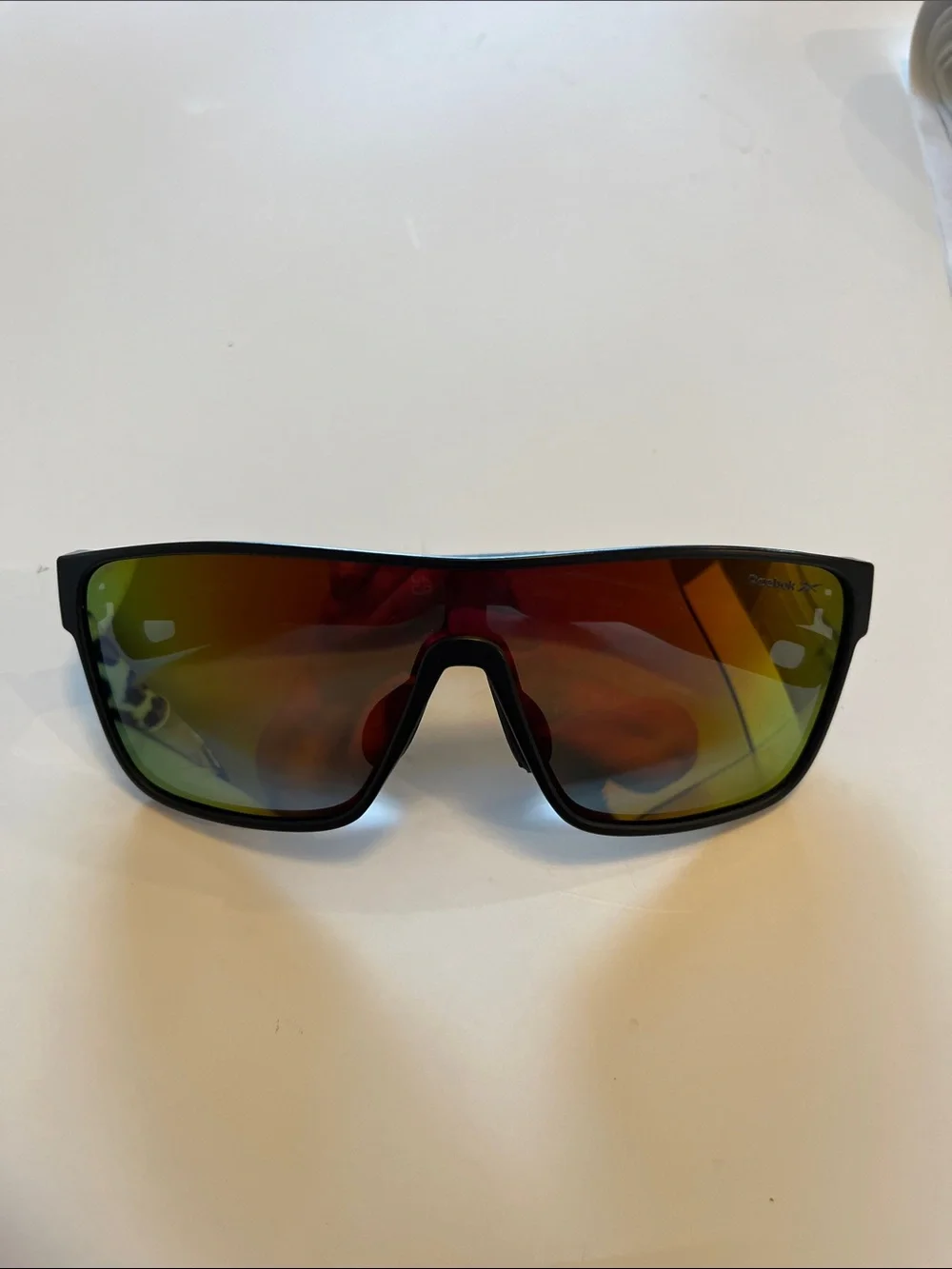 Reebok Black Frame Sunglasses with Red-Gold Mirrored Lens